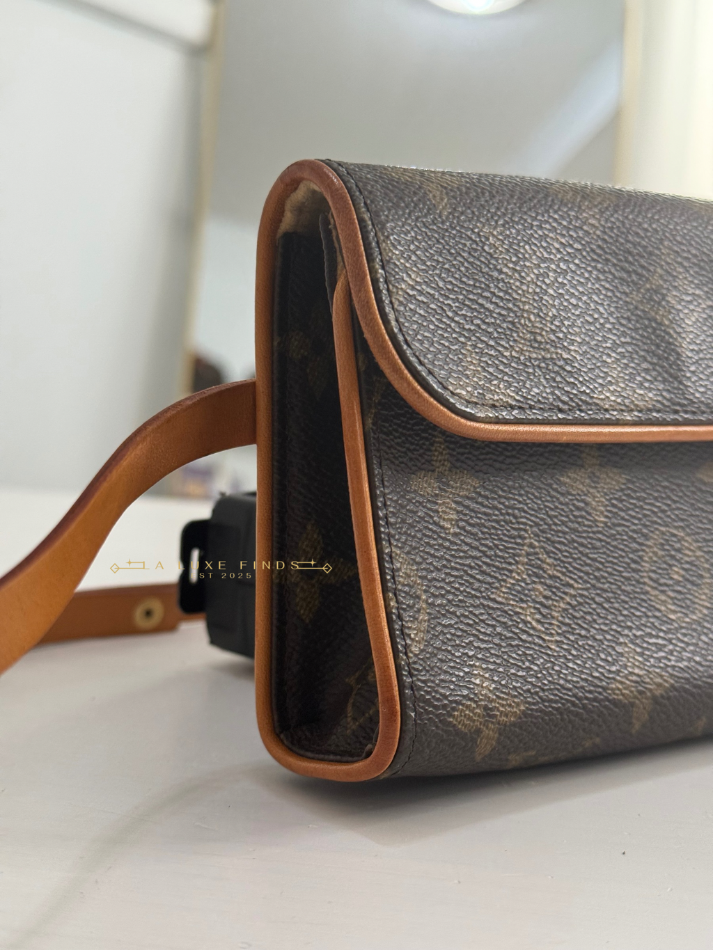 LOUIS VUITTON Florentine Pochette Waist Bag